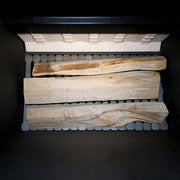 GEMA Shop Holzvergaserkessel ROJEK PK BIO 30 mit eingelegten Holzscheiten in der großen Brennkammer